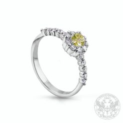 Пръстен в бяло злато с централен жълт диамант 0.25к